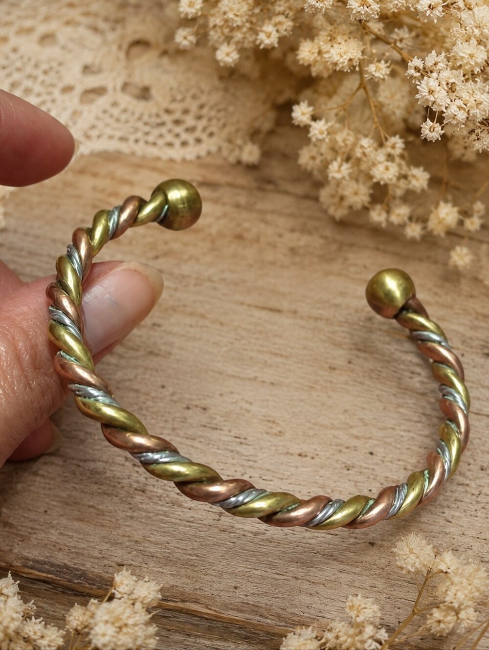 Twisted copper, brass, and silver tone metal cuff bracelet